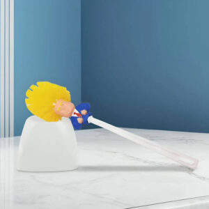 Close-up of Donald Trump toilet brush with exaggerated hair, a funny political novelty cleaning tool.