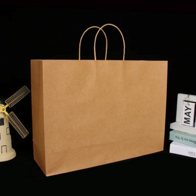 2-brown-kraft-gift-bag-with-books-and-miniature-mill-close-up-p451